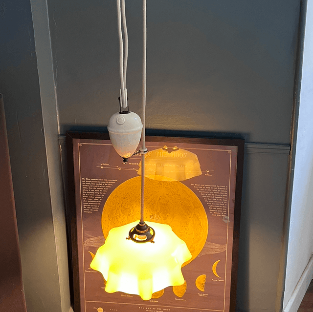 Lampe / suspension en opaline avec monte et baisse en céramique  